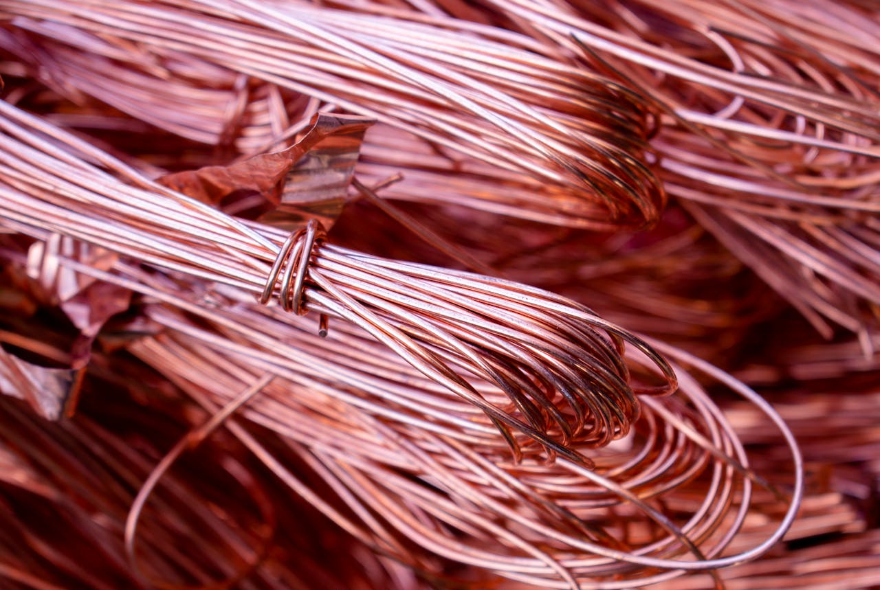 services-02 Detailed view of copper wires showcasing metallic texture and recycling theme.